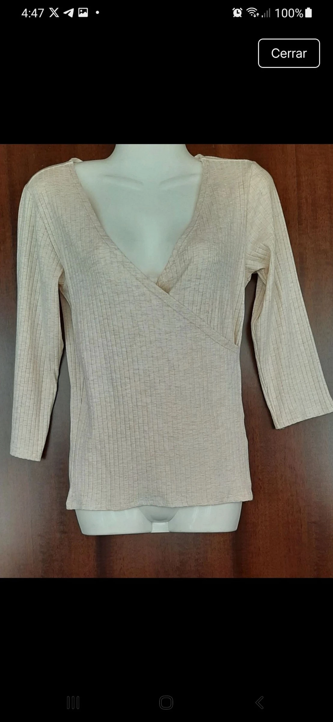 Blusa de color beige talla M